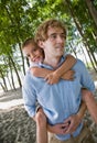 Father giving son piggy back ride Royalty Free Stock Photo