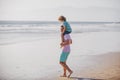 Father giving son ride on back outside. Dad and child enjoying outdoor. Little boy kid with daddy carrying him on Royalty Free Stock Photo