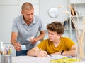 Father giving son money Royalty Free Stock Photo
