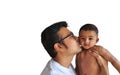 A father in glasses kissing a little boy on his lap in white background Royalty Free Stock Photo