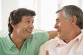 Father and grown up son talking Royalty Free Stock Photo