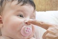 Father Hand Touching The Nose Of A Newborn Baby boy Royalty Free Stock Photo