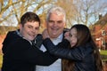 Father has fun with his two grown up children Royalty Free Stock Photo