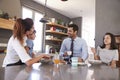 Father Having Family Breakfast In Kitchen Before Leaving For Work Royalty Free Stock Photo