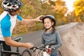 Father help his son ride a bicycle Royalty Free Stock Photo