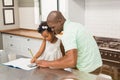 Father helping his daughter with homework Royalty Free Stock Photo