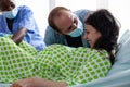 Father helping mother with contractions Royalty Free Stock Photo