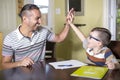 Father helping son do homework. Parent helps his child Royalty Free Stock Photo