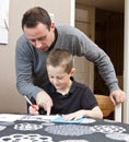 Father helping son with homework