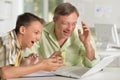 Father helping son with homework Royalty Free Stock Photo