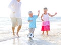 Father and his kids playing football together Royalty Free Stock Photo
