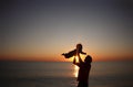 Father and his little baby son play on sunset beach. Family vacation on the sea. Royalty Free Stock Photo