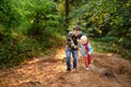 Father and his little son during the hiking activities in forest Royalty Free Stock Photo