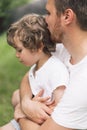 Father and his son playing and hugging in outdoors. Concept of Father`s day. Royalty Free Stock Photo