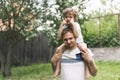 Father and his son playing and hugging in outdoors. Concept of Father`s day. Royalty Free Stock Photo