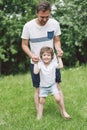 Father and his son playing and hugging in outdoors. Concept of Father`s day. Royalty Free Stock Photo