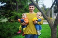 Father with his twins Royalty Free Stock Photo