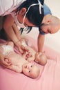 Father with his twins at pediatrititian Royalty Free Stock Photo