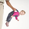 Father holding baby toddler suspended