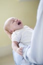 Father Holding Crying Newborn Child Royalty Free Stock Photo