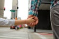 Father holding the daughter/ child hand behind the traffic lights. Royalty Free Stock Photo