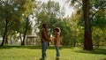 Father holding daughter hands touching forehead. Emotional connection child dad. Royalty Free Stock Photo