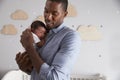 Father Holding Newborn Baby Son In Nursery Royalty Free Stock Photo