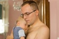 Father holding sleeping baby Royalty Free Stock Photo