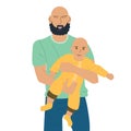 The father is holding a small child in his arms. Bald bearded dad smiles with his son