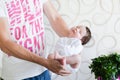 Father holds the child. Father holds his young child in a towel on his hand Royalty Free Stock Photo