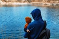 The father holds his son in his arms. Walking in nature with the family.