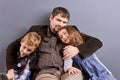 Father hugging his son and daughter. Royalty Free Stock Photo