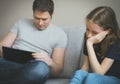 Father ignoring his daughter. Royalty Free Stock Photo