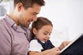 Father, kid with book for reading and storytelling, happy with bonding at home and knowledge for education. Man, young Royalty Free Stock Photo