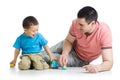 Father and kid play with car toys together Royalty Free Stock Photo