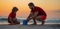 Father and kid son build sand castle at the summer beach, Kid and father building sandcastle. Father and child son Royalty Free Stock Photo