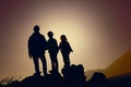 Father with kids-boy and girl- travel in sunset mountains Royalty Free Stock Photo