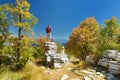 Father and kids exploring Stone forest, natural rock formation, created by multiple layers of stone, located near Monodendri