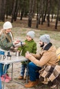 father and kids with hot drinks outdoors Royalty Free Stock Photo