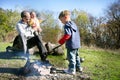 Father and kids on picnic place