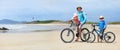 Father and kids riding bikes Royalty Free Stock Photo