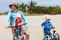 Father and kids riding bikes Royalty Free Stock Photo