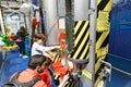 Father and kids in Science Center museum Nemo, Amsterdam, experiments with water Royalty Free Stock Photo