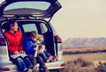 Father with kids travel by car in mountains Royalty Free Stock Photo