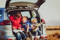 Father with kids travel by car in mountains Royalty Free Stock Photo