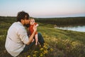 Father kissing baby daughter walking outdoors happy family Royalty Free Stock Photo