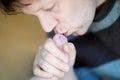 Father kissing foot of newborn baby. Royalty Free Stock Photo