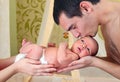 Father kissing his newborn baby boy Royalty Free Stock Photo