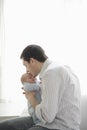 Father Kissing His Newborn Baby Royalty Free Stock Photo