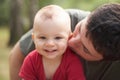 Father kissing his son Royalty Free Stock Photo